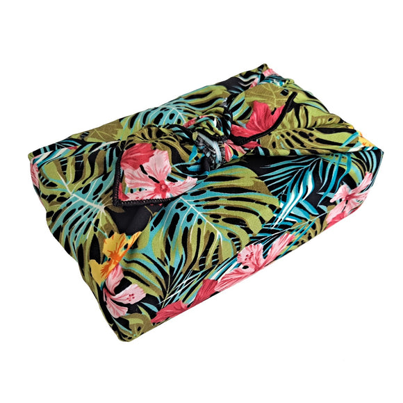 Gift wrapped in a furoshiki with a tropical palms print