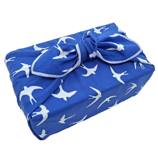 Gift wrapped in a swallow pattern furoshiki